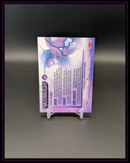 Rückseite einer Marvel Trading Card mit Spider-Woman Illustration und Kartendetails auf Ständer