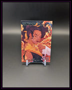 Trading Card mit animierter Frau, dynamischen Flammen und Schriftzug 'Matriarchs', Sammelkarte