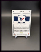 Rückseite einer NFL Dameon Pierce Trading Card der Houston Texans auf Kartenständer