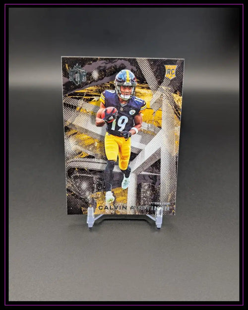 American Football Trading Card mit Spieler in schwarzer und gelber Uniform, Rookie Card Symbol sichtbar