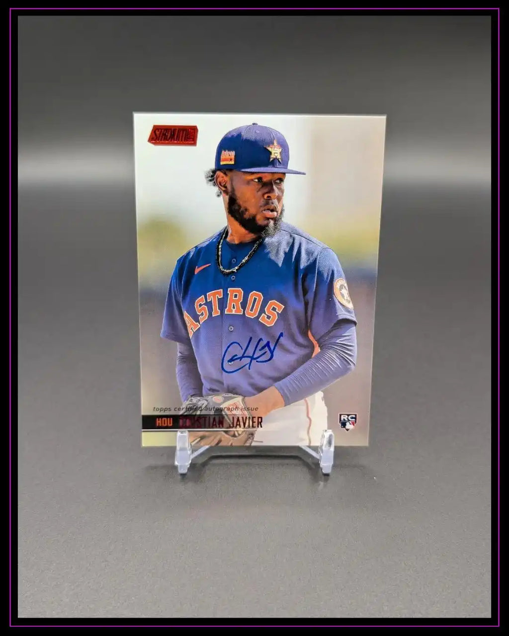Baseball-Trading-Card mit Houston Astros Spieler im blauen Trikot, Autogramm sichtbar.